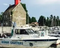 Midway Charter Boat at marina dock.
