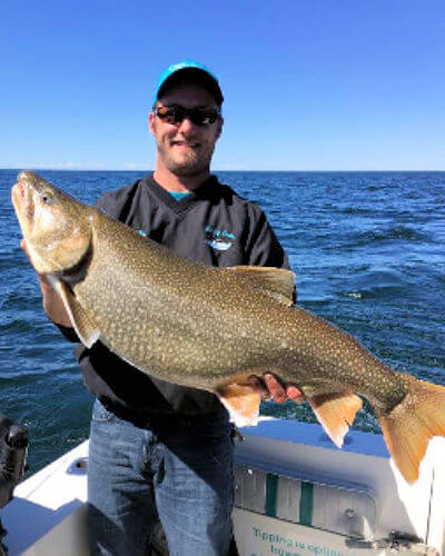 Another satisfied angler holds out nive king salmon.